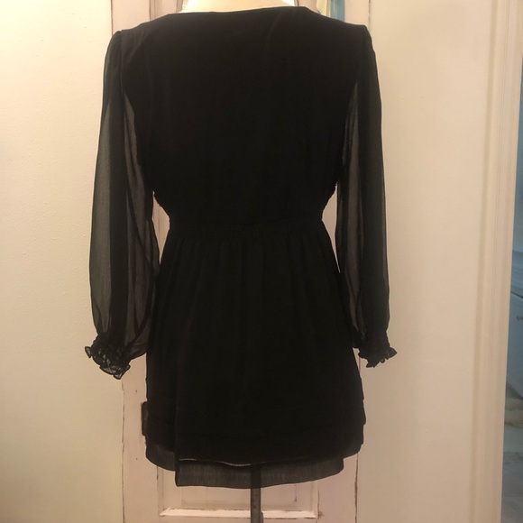 Black with rose covered bodice and sheer long sleeves made from rayon - Picture 2 of 2